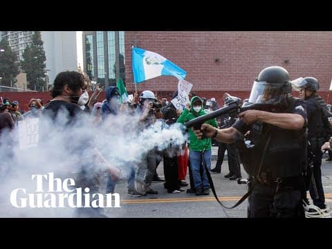 Protesters dispersed with 'less lethal rounds' outside the federal building in LA