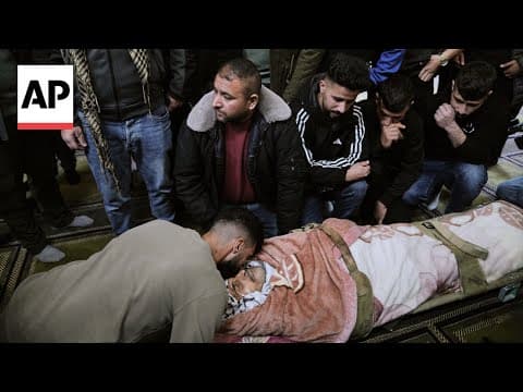 Mourners attend funeral for Palestinian man shot by Israeli forces at West Bank checkpoint
